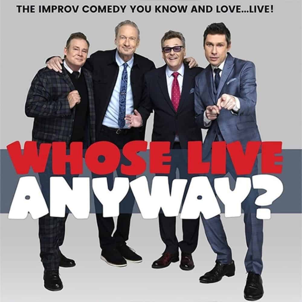 Four men standing together promoting an improv comedy show titled "Whose Live Anyway?" set in the historical setting of Islamic Spain.