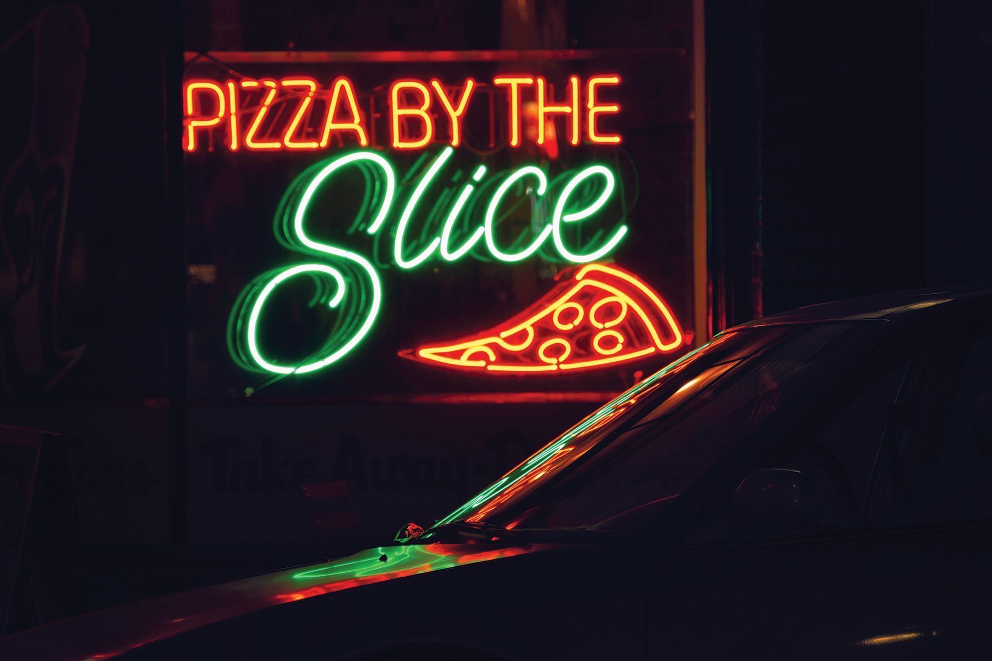 Pizza by the slice neon sign Pizza by the slice neon sign