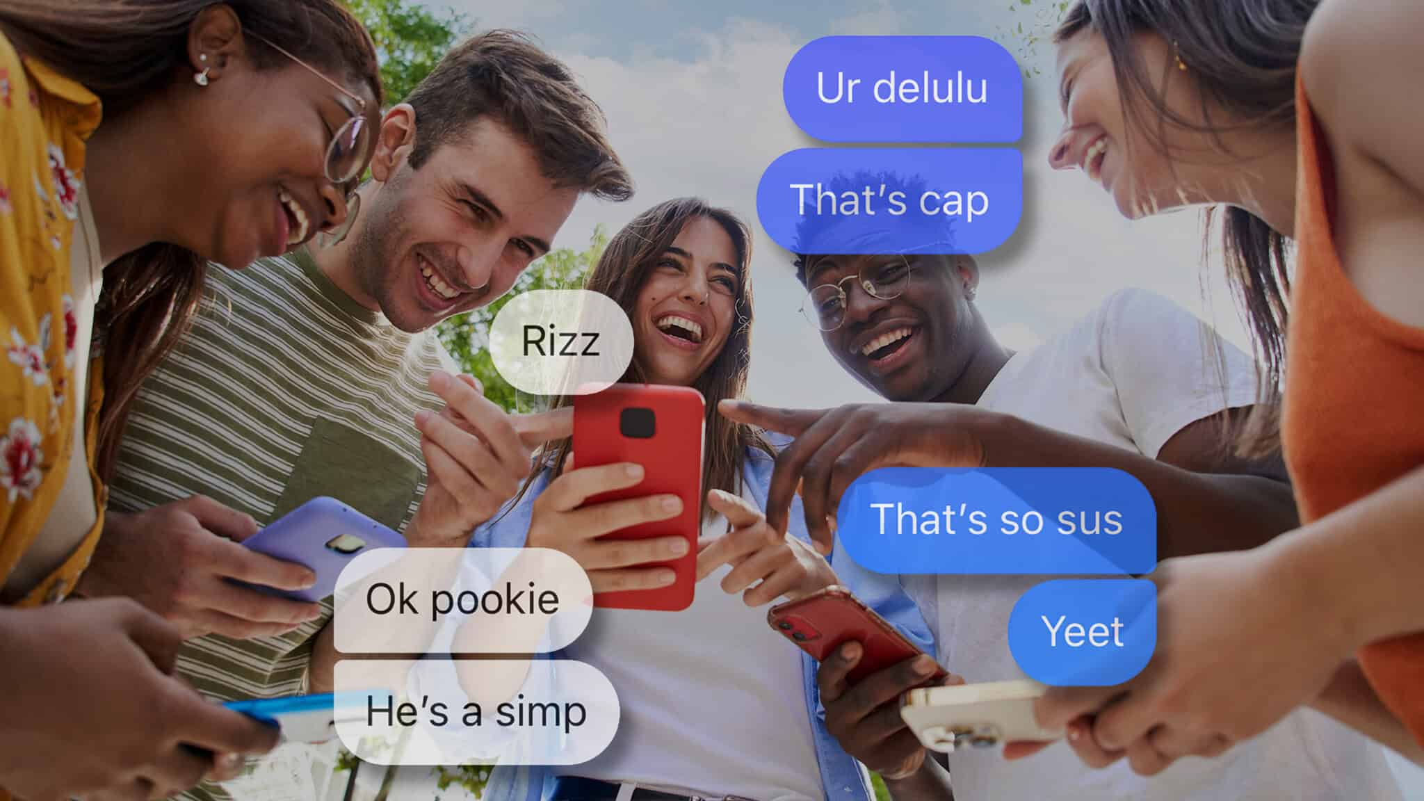 GenZslangTerms_16x9 A group of five diverse young people are standing close together outdoors, smiling and laughing while looking at smartphones. Text message bubbles with expressions like "Ur delulu," "Yeet," and "This is bussin, no cap" are overlaid.