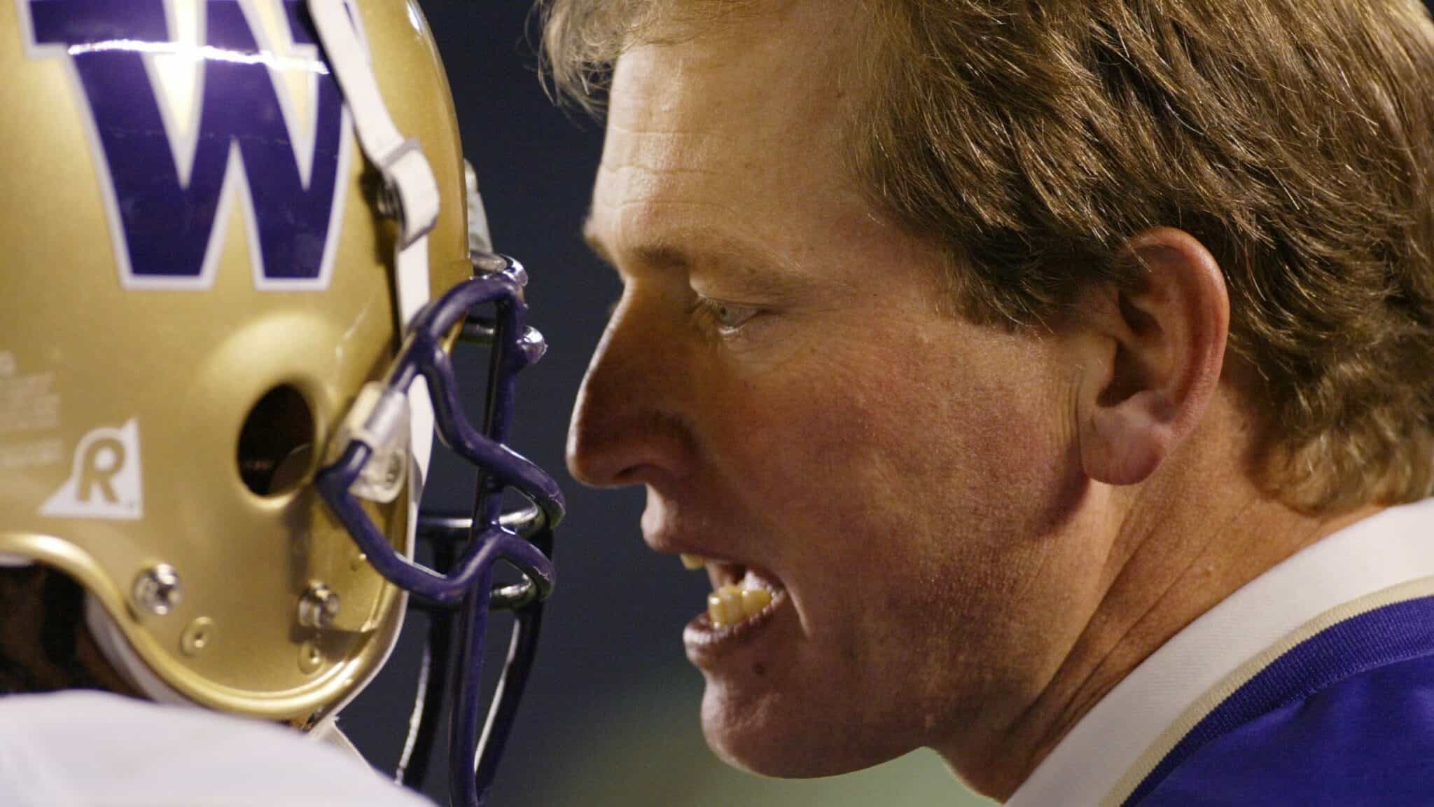 GettyImages-72443512 cropped-min Rick Neuheisel was caught red-handed by a sportswriter in an airport.