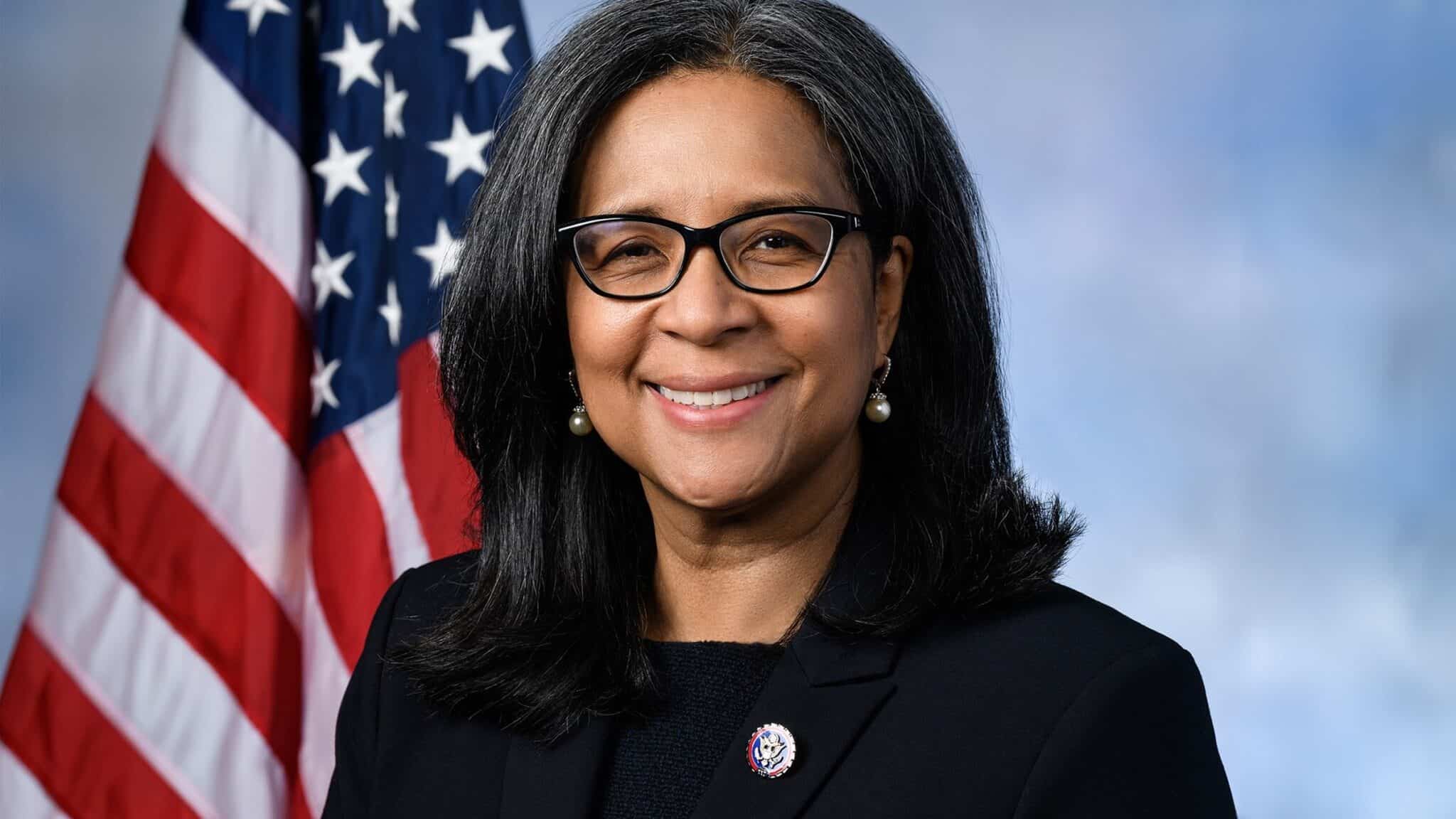 Marilyn-Strickland_16x9-min An official portrait of Marilyn Strickland smiling in front of an American flag.