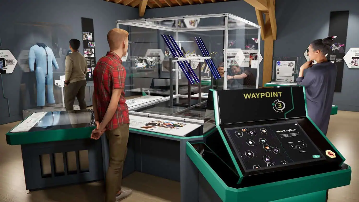 Rendering 3 Seattle Bis Mag 16x9 People are observing various displays and exhibits in a modern technology museum, including a central glass case with a model and an interactive touchscreen labeled "WAYPOINT," reminiscent of those found at the renowned Museum of Flight, that explores life in orbit.