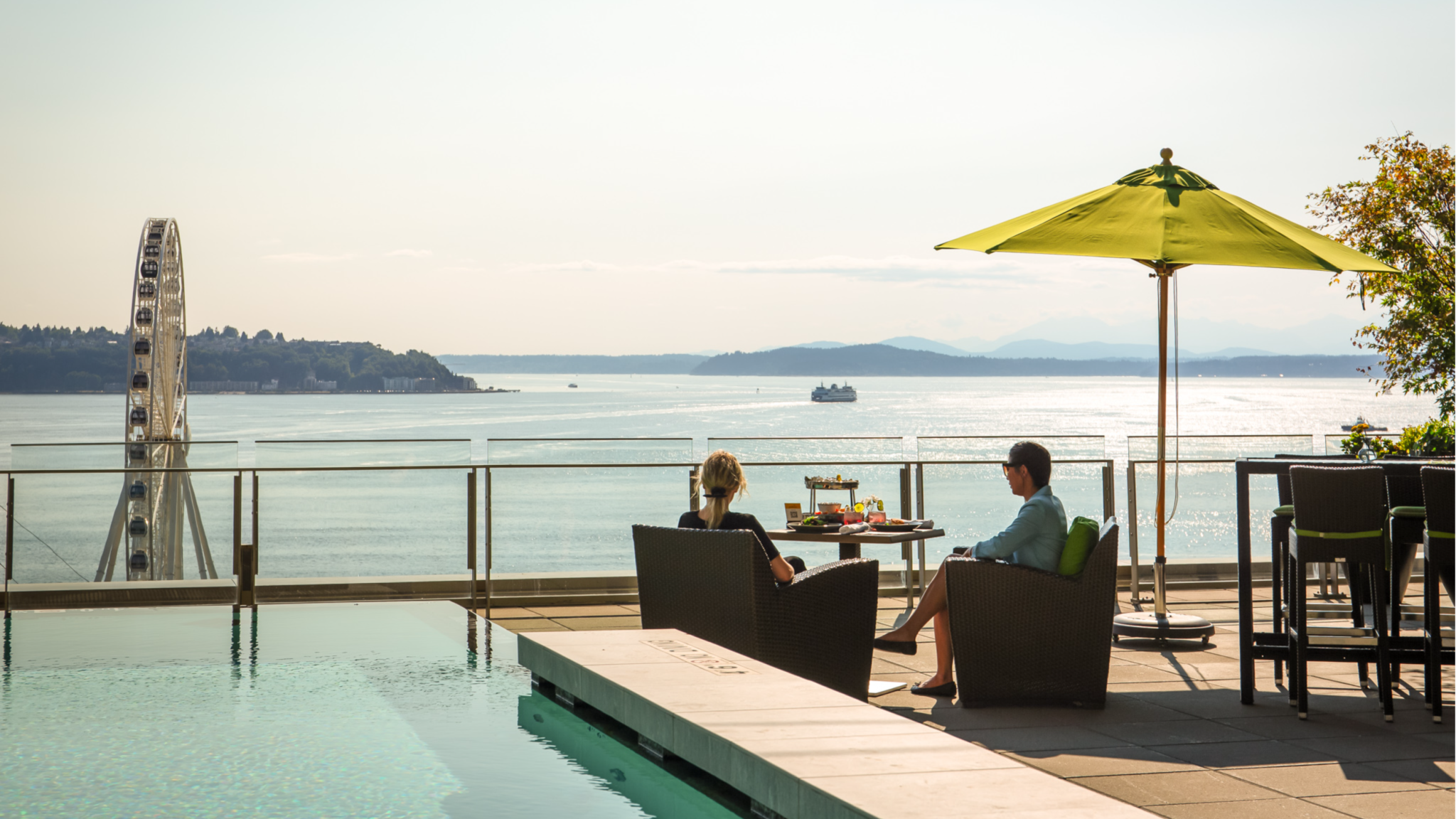 FS Seattle's INFINITY pool + bar -cropped View of Elliot Bay poolside
